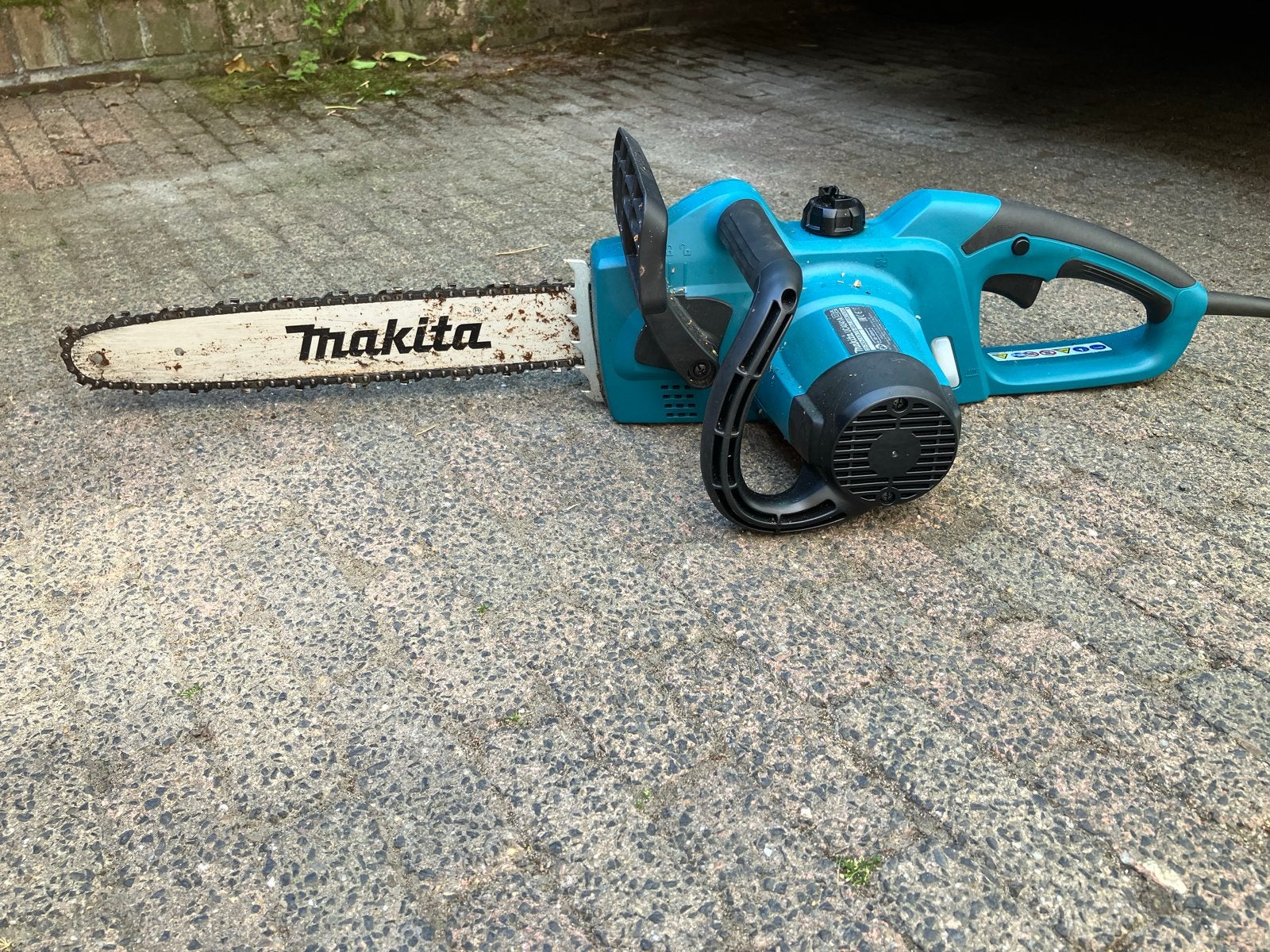 Makita UC4041A elektrische kettingzaag met slijper, Ophalen, Gebruikt, 70 mm of meer, Kettingzaag