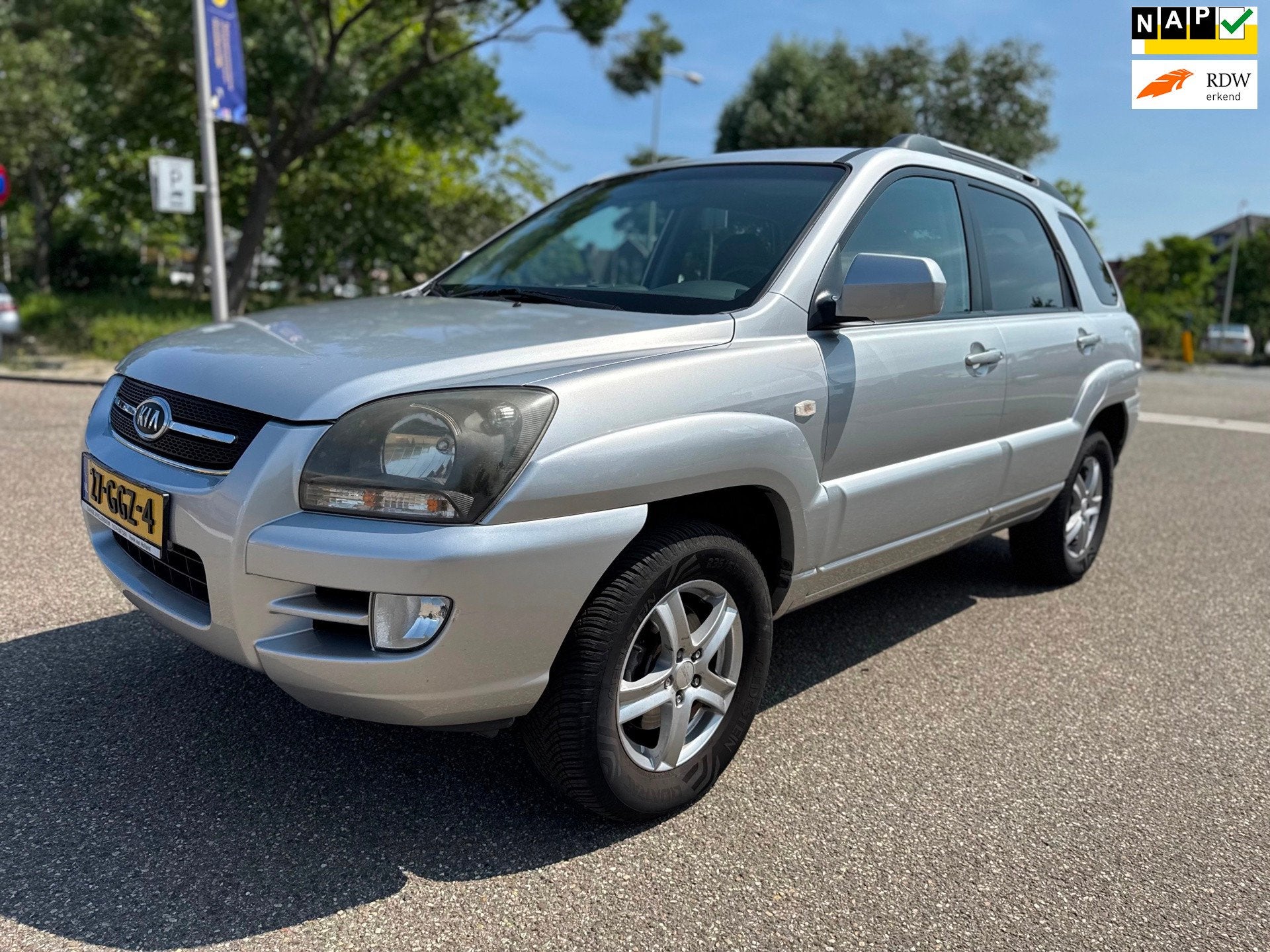 Kia Sportage 2.0 CVVT Comfort / airco / cruise.control / ele, Auto's, Gebruikt, Origineel Nederlands, Handgeschakeld, Zilver of Grijs