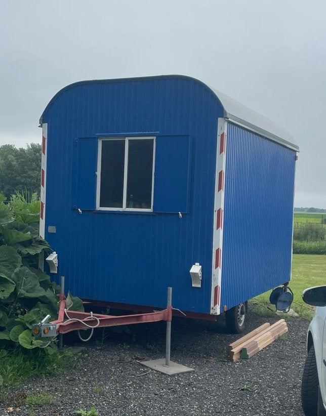 Blauwe bouwkeet / schaftwagen te koop, Ophalen
