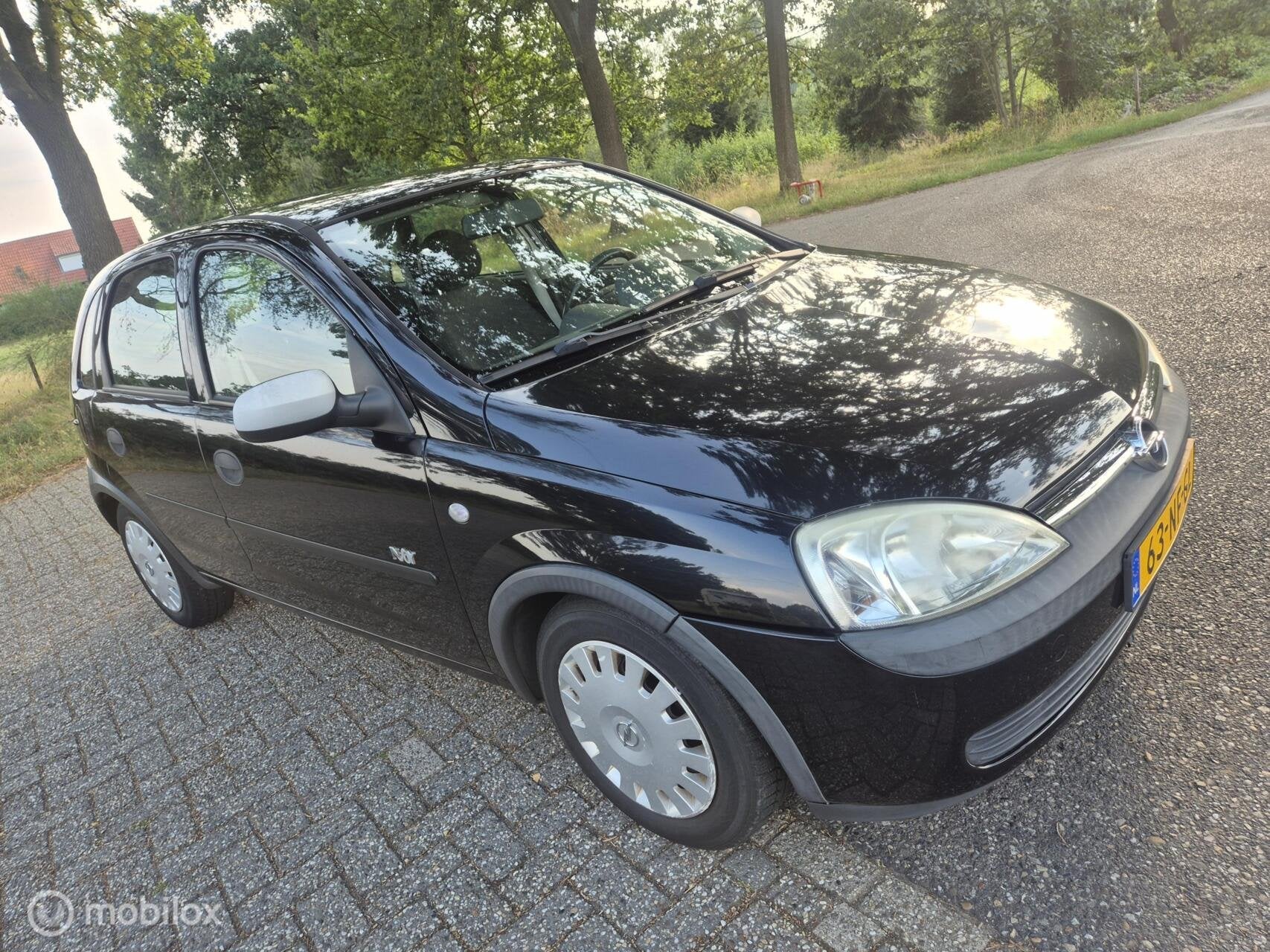 Opel Corsa 1.2-16V Comfort 5 deurs, Auto's, Voorwielaandrijving, 450 kg, Gebruikt, 31 €/maand
