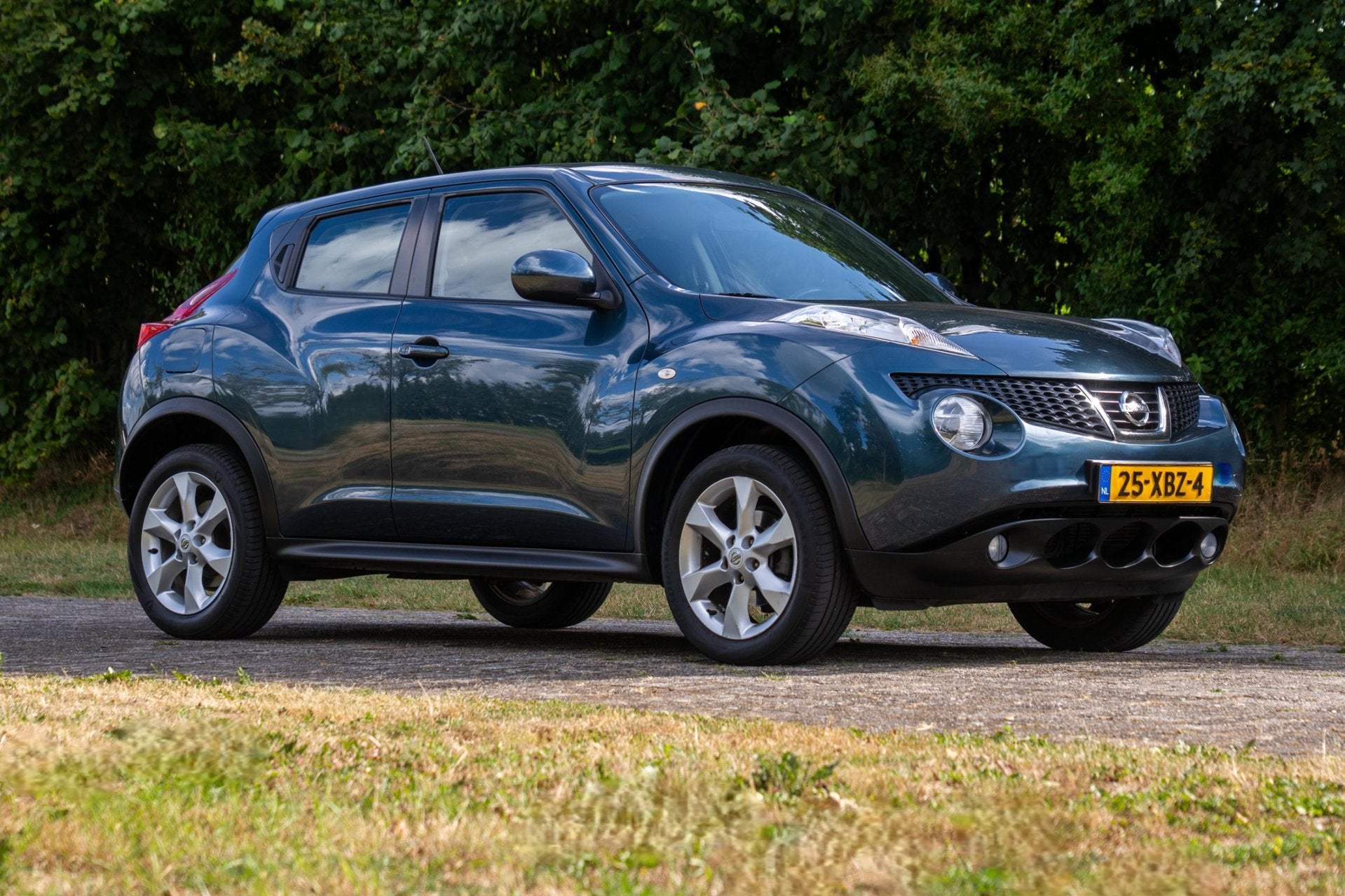 Nissan Juke 1.6 Acenta Automaat 2e Eigenaar +NAP NL-auto, Auto's, Nissan, Euro 5, Stof, Zwart, 4 cilinders