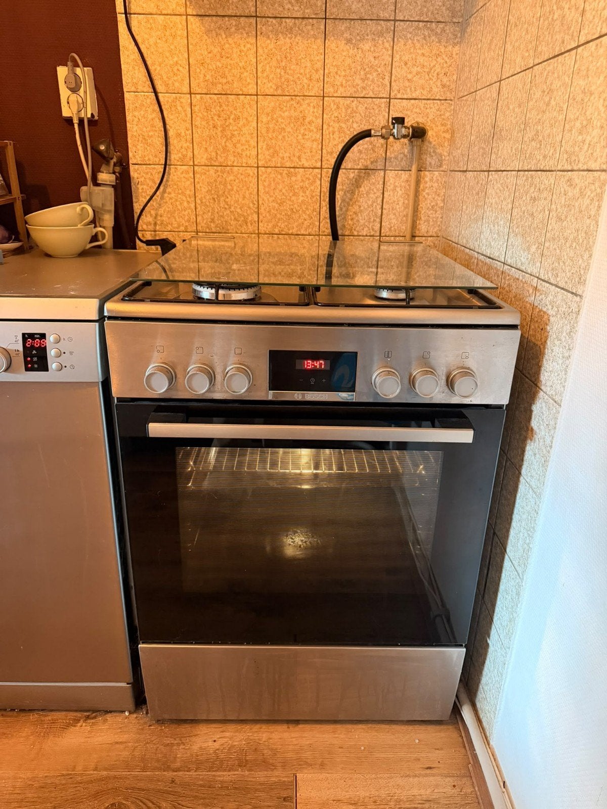 Bosch Serie 4 fornuis RVS, Witgoed en Apparatuur, Ophalen, 4 kookzones, Zo goed als nieuw, Gas