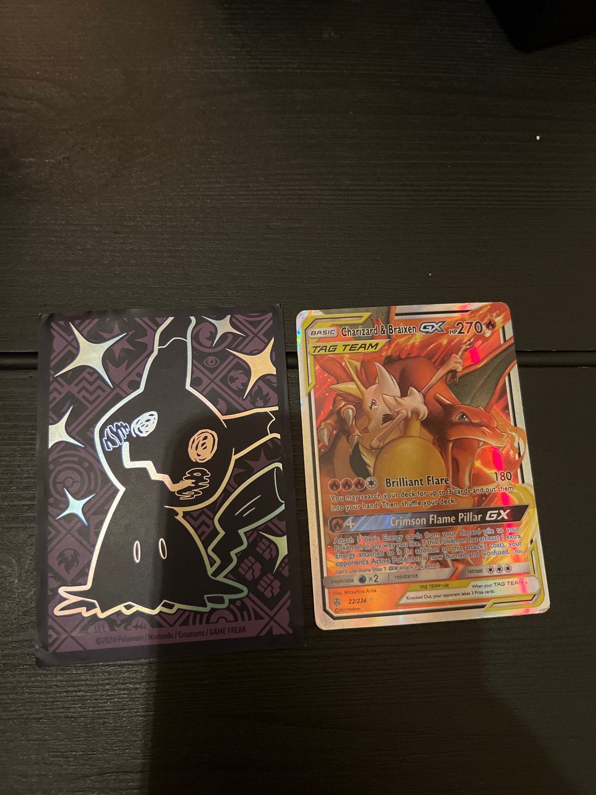 Charizard & Braixen GX Pokémon kaart met sleeve, Ophalen of Verzenden, Gebruikt, Losse kaart