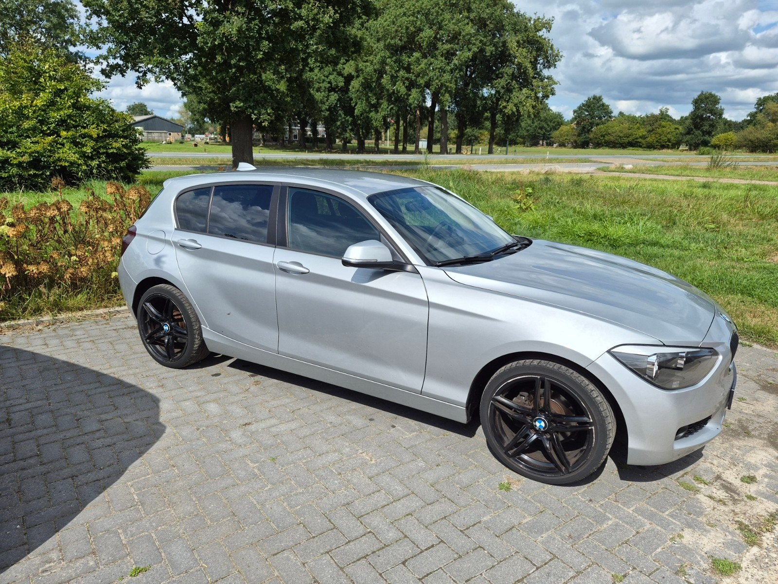 BMW 1-Serie 116I 100KW 5DR Auto 2012 Grijs, Zwart, 4 cilinders, Origineel Nederlands, 1200 kg
