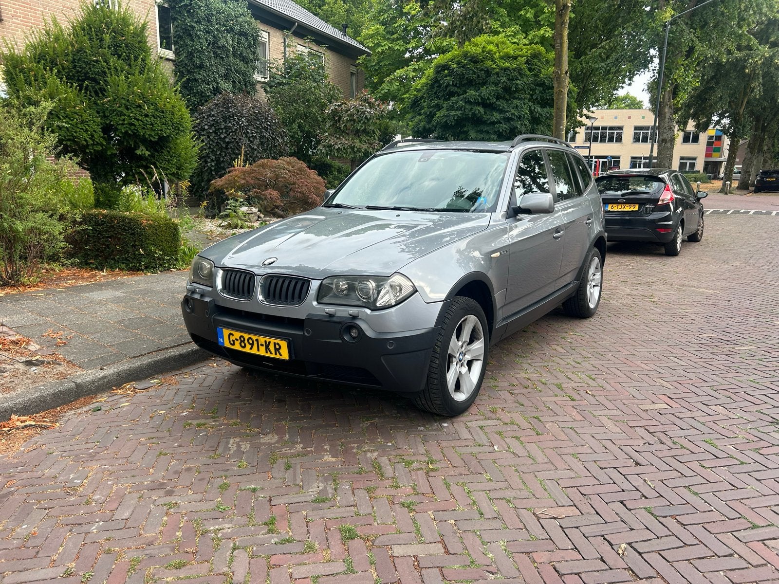 BMW X3 2.5 2004, Auto's, Automaat, Stof, 1800 kg, Zwart