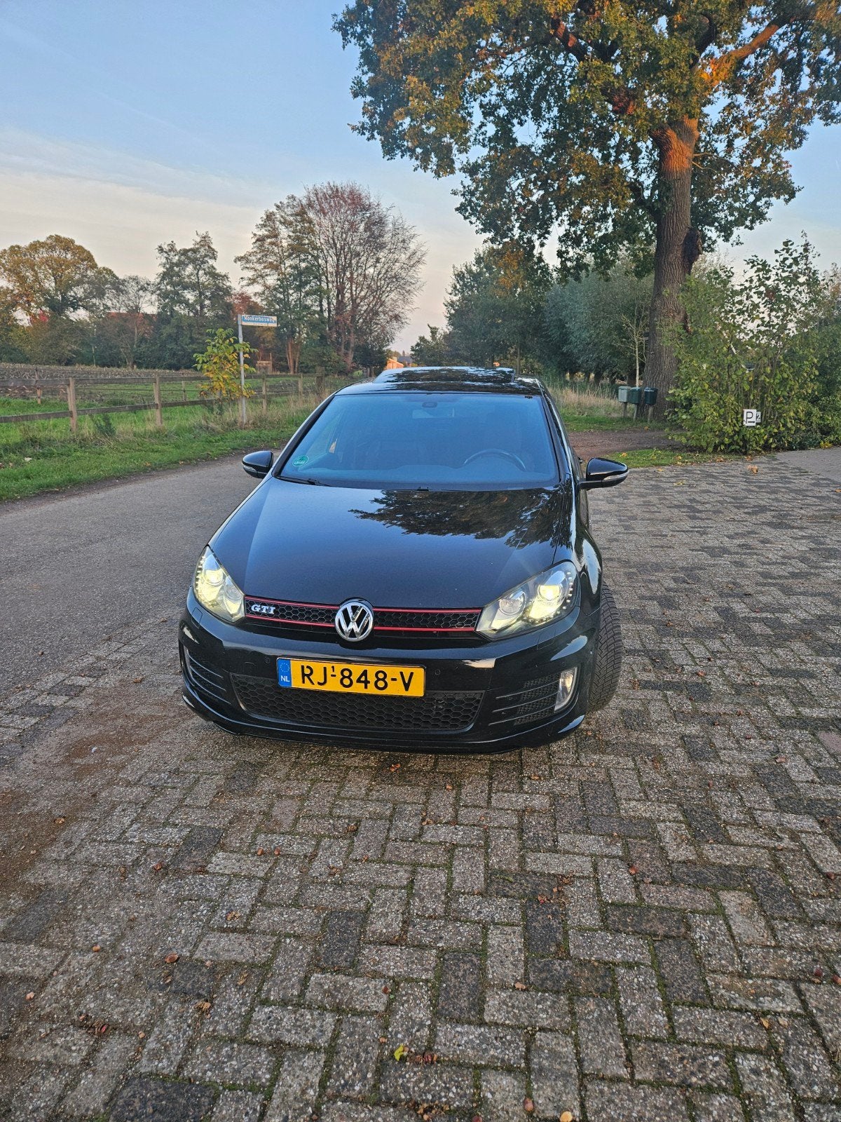 Volkswagen Golf 2.0 GTI 173KW DSG 2012 Zwart, Auto's, Zwart, 4 cilinders, Zwart, 1320 kg