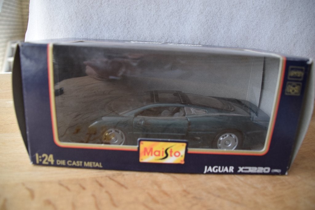 modelauto 1:24, Ophalen of Verzenden, Zo goed als nieuw, Auto, Bburago
