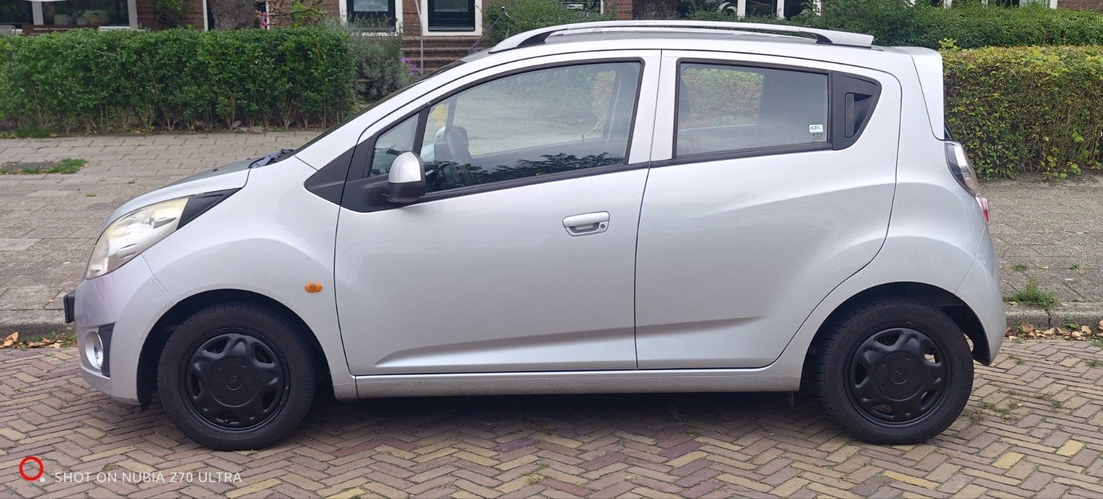 Chevrolet Spark 1.0 Bifuel 2011 Grijs, Auto's, 15 km/l, 37 €/maand, 4 cilinders, Origineel Nederlands