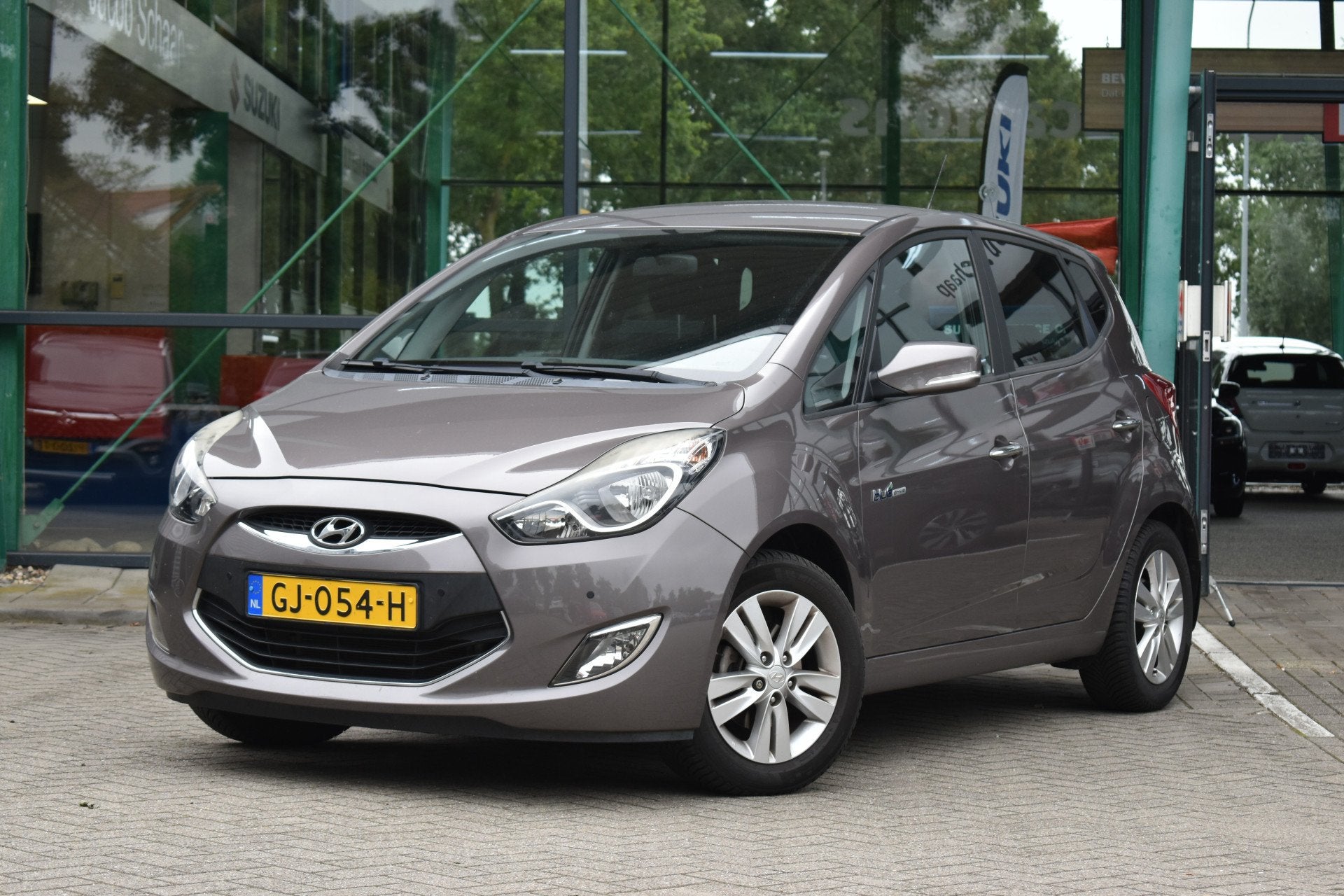 Hyundai ix20 1.4i Go! Handgeschakeld 90pk | Airco | Navigati, Auto's, Stof, Gebruikt, Zwart, 4 cilinders
