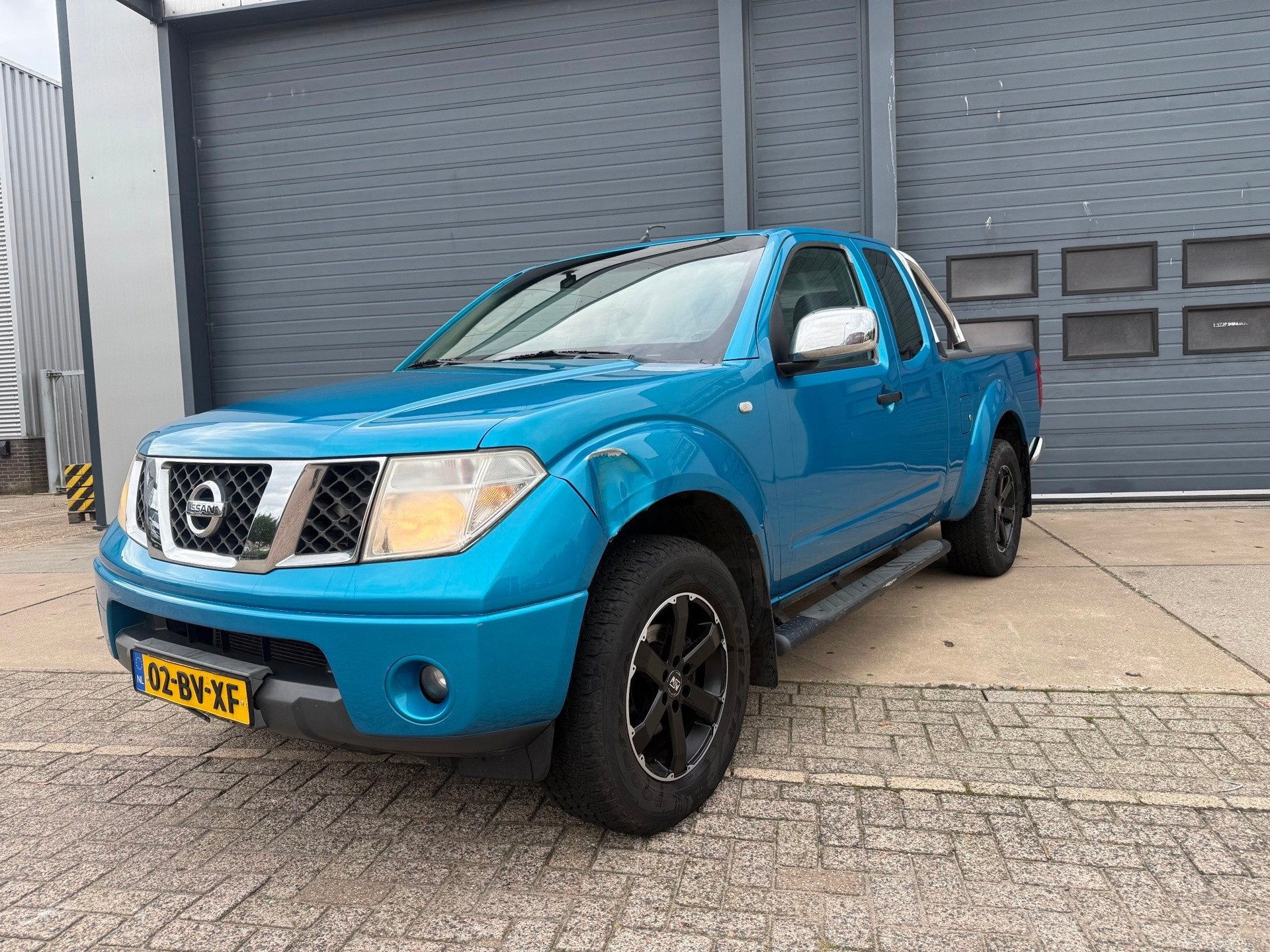 Nissan Navara 2.5 dCi SE King Cab, Auto's, Stof, Gebruikt, 4 cilinders, Blauw