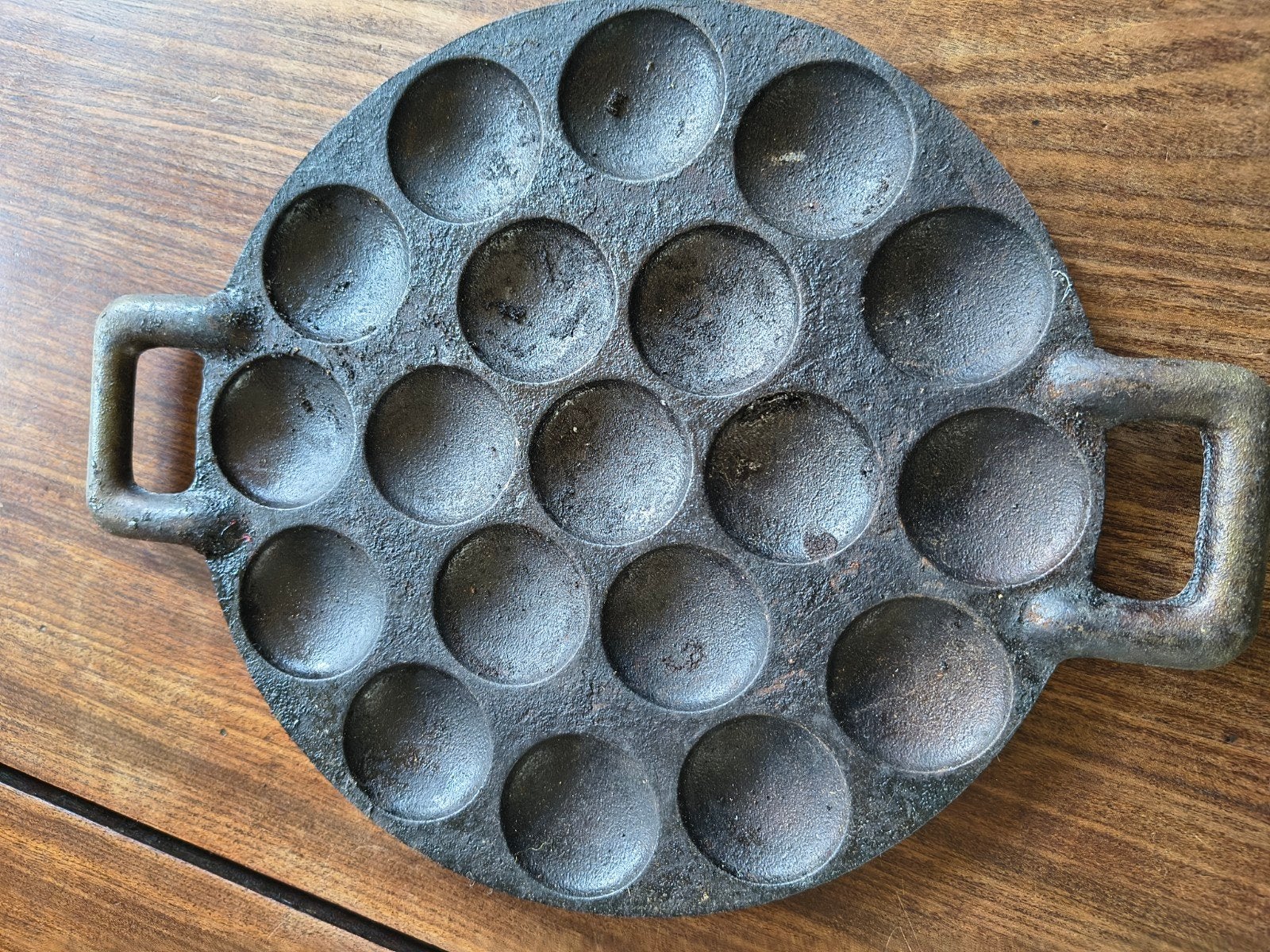 Oude poffertjes pan, Ophalen