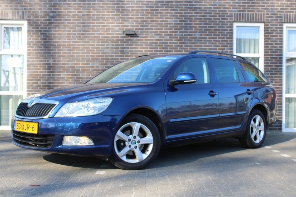 Skoda Octavia Combi 1.2 TSI Tour-clima-navi-stoelverw-PDC, Auto's, Voorwielaandrijving, Euro 5, Stof, Gebruikt