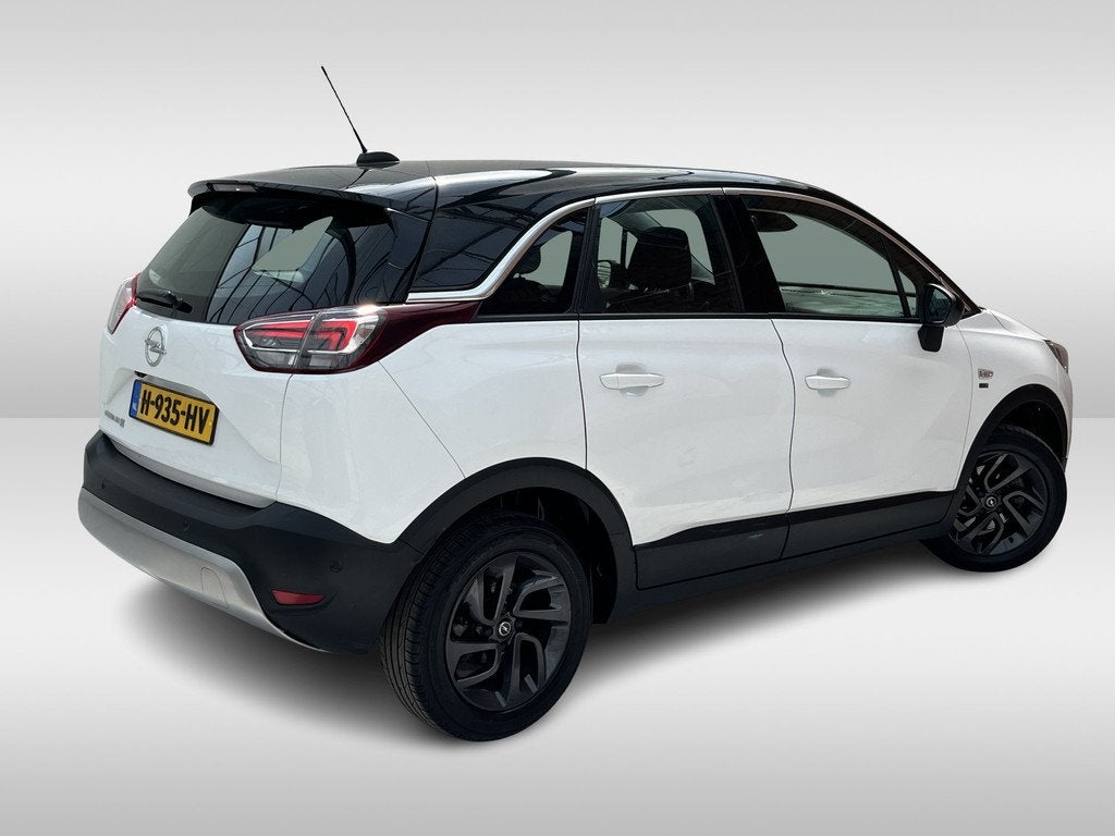 Opel Crossland X Turbo 120 Jaar Edition | Automaat | Camera, Auto's, Gebruikt, Euro 6, Automatische klimaatregeling, Wit