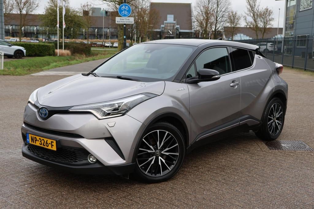 Toyota C-HR 1.8 Hybrid Bi-Tone | 98.000 km | Leder | Trekhaa, Auto's, Toyota, 4 cilinders, 26 km/l, Hybride Elektrisch/Benzine