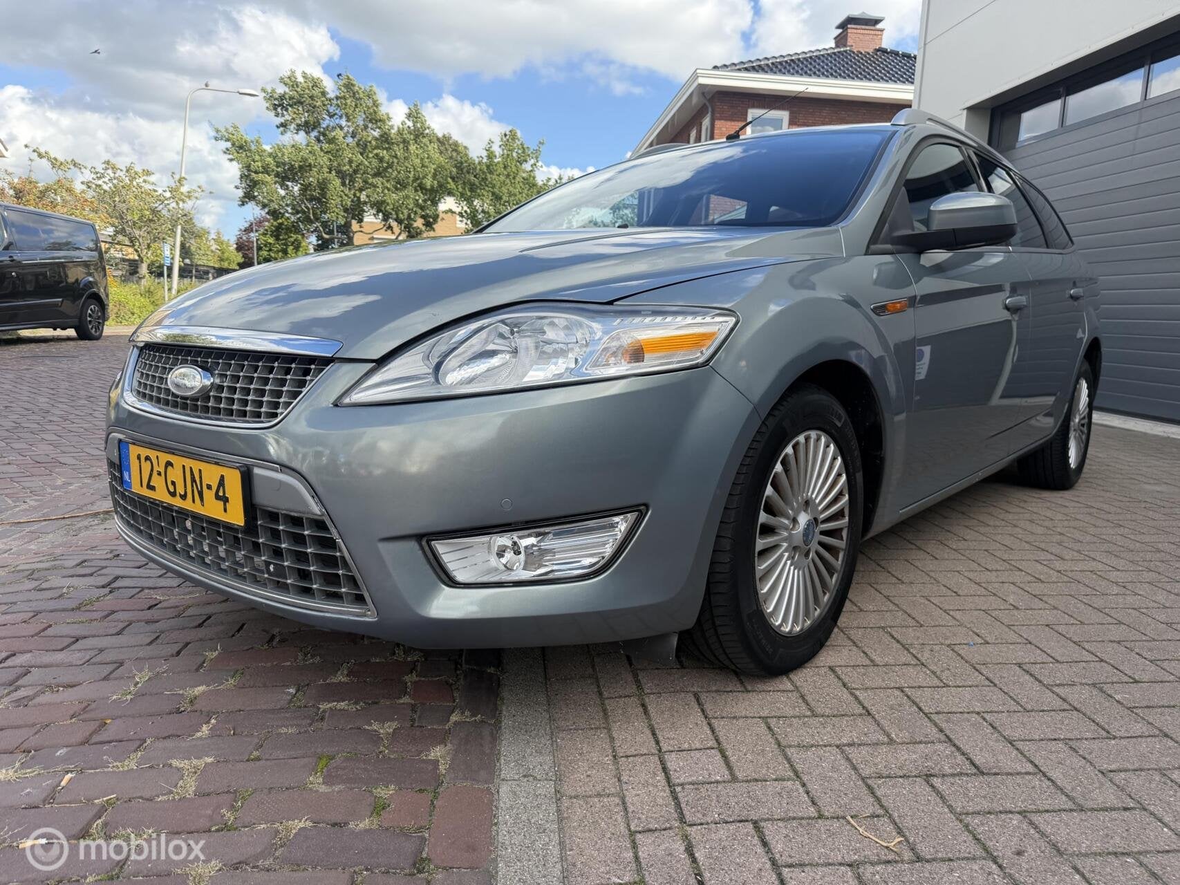 Ford Mondeo Wagon 2.3-16V Titanium AUTOMAAT/NAVI/TREKHAAK, Auto's, Gebruikt, 4 cilinders, Mondeo, 160 pk