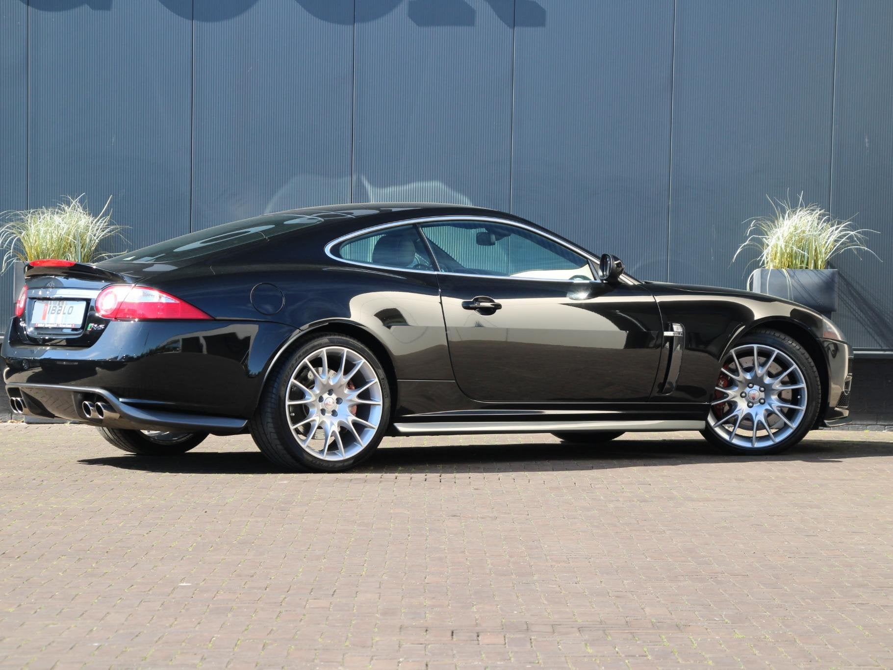 Jaguar XKR-S 4.2 V8 Coupé | 1 van 150 | B&W audio | NL-auto, Achterwielaandrijving, Gebruikt, Automatische klimaatregeling, Zwart