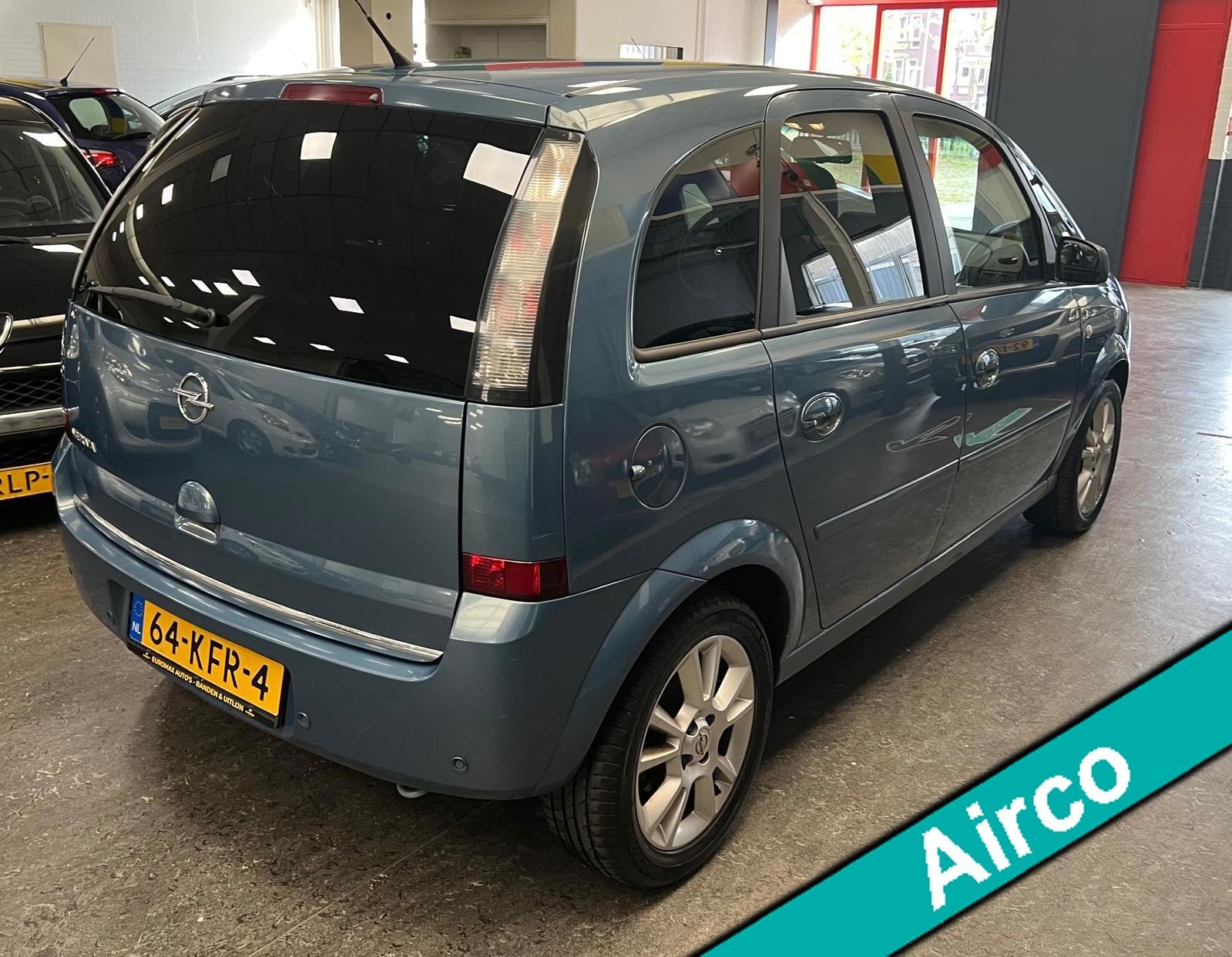 Opel Meriva 1.6-16V Cosmo 2e Eigenaar - NAP - Parkeersensor, Auto's, Voorwielaandrijving, Verwarmde buitenspiegels, 15 km/l, Gebruikt