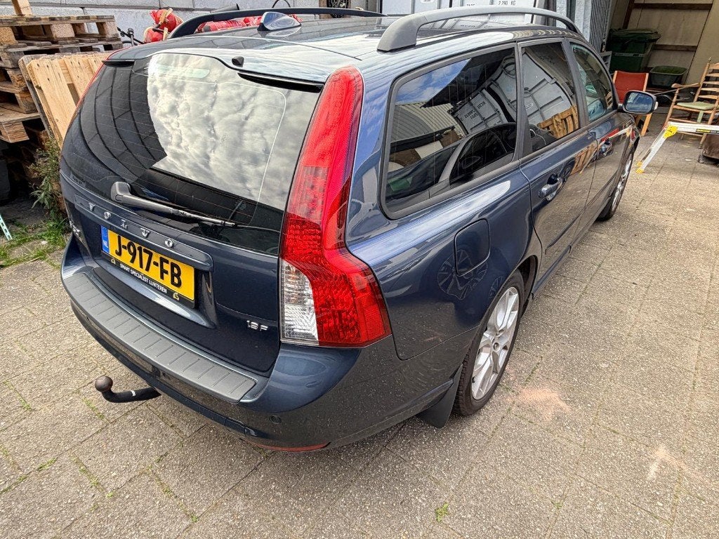 Volvo V50 1.8 Flexifuel 2009 Blauw, Auto's, Voorwielaandrijving, 125 pk, Zwart, Blauw