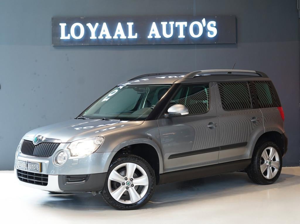 Skoda Yeti 1.2 TSI Tour | NAVI | AIRCO | CRUISE | PDC | TREK, Auto's, Voorwielaandrijving, Euro 5, Parkeersensor, Gebruikt