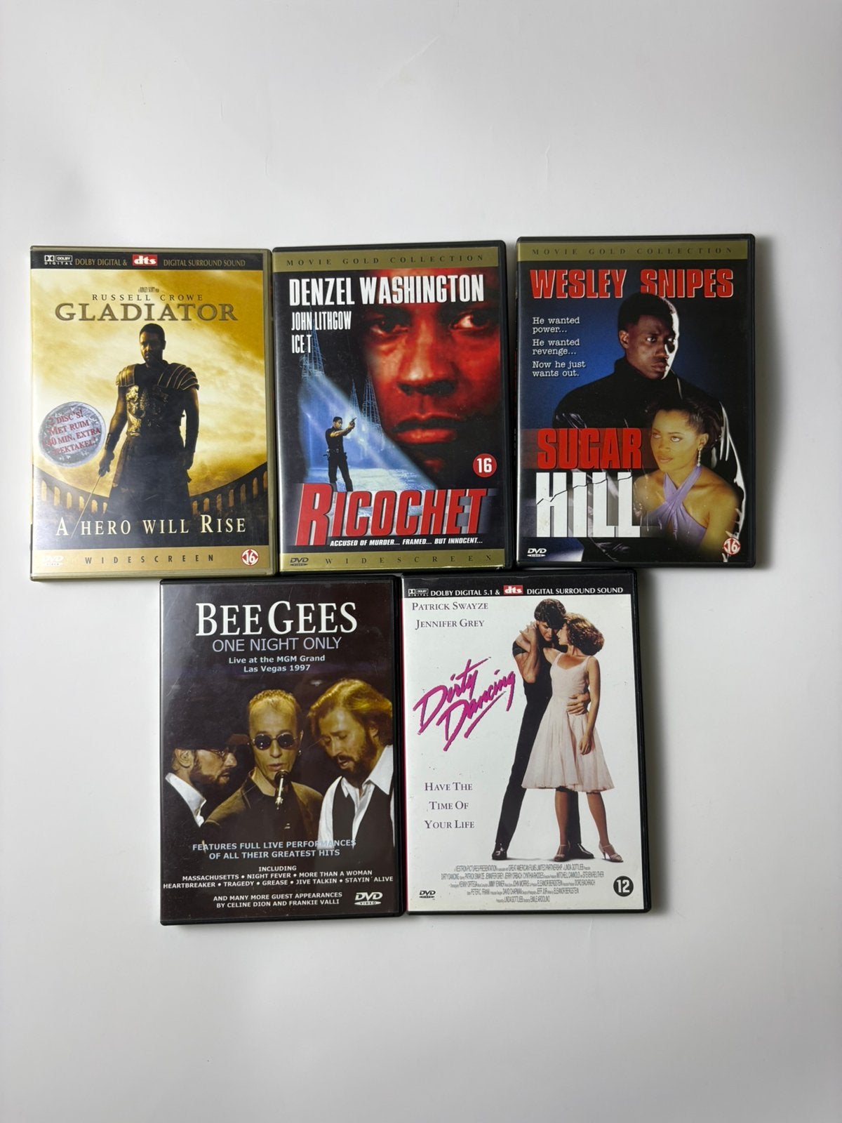 Set van 5 DVD's (Gladiator, Dirty Dancing, Bee Gees, etc.), Cd's en Dvd's, Ophalen of Verzenden, Zo goed als nieuw