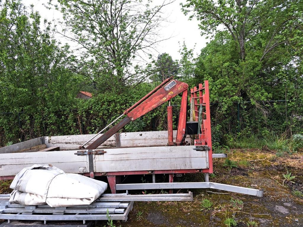 OpenLaadbak en gesloten, Ophalen