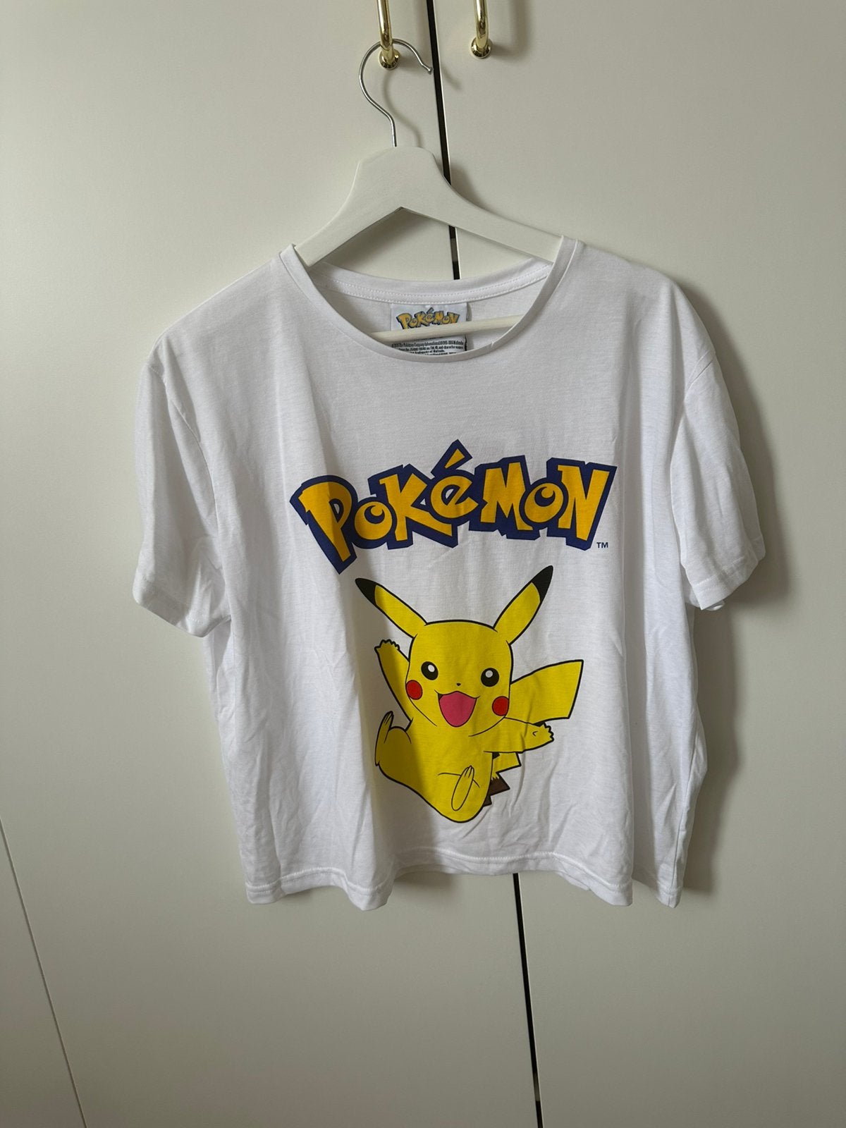 Nieuw! Pokémon Pikachu t-shirt maat 44, Wit, Maat 42/44 (L), Nieuw, Ophalen of Verzenden