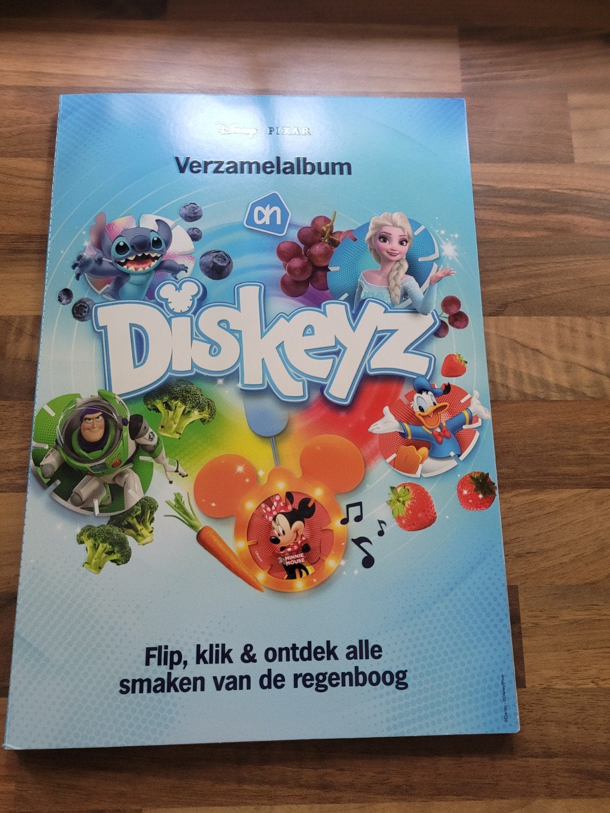 Disney Diskeyz verzamelalbum compleet met munten, Verzamelen, Ophalen of Verzenden, Overige figuren, Zo goed als nieuw, Papier, Kaart of Schrift