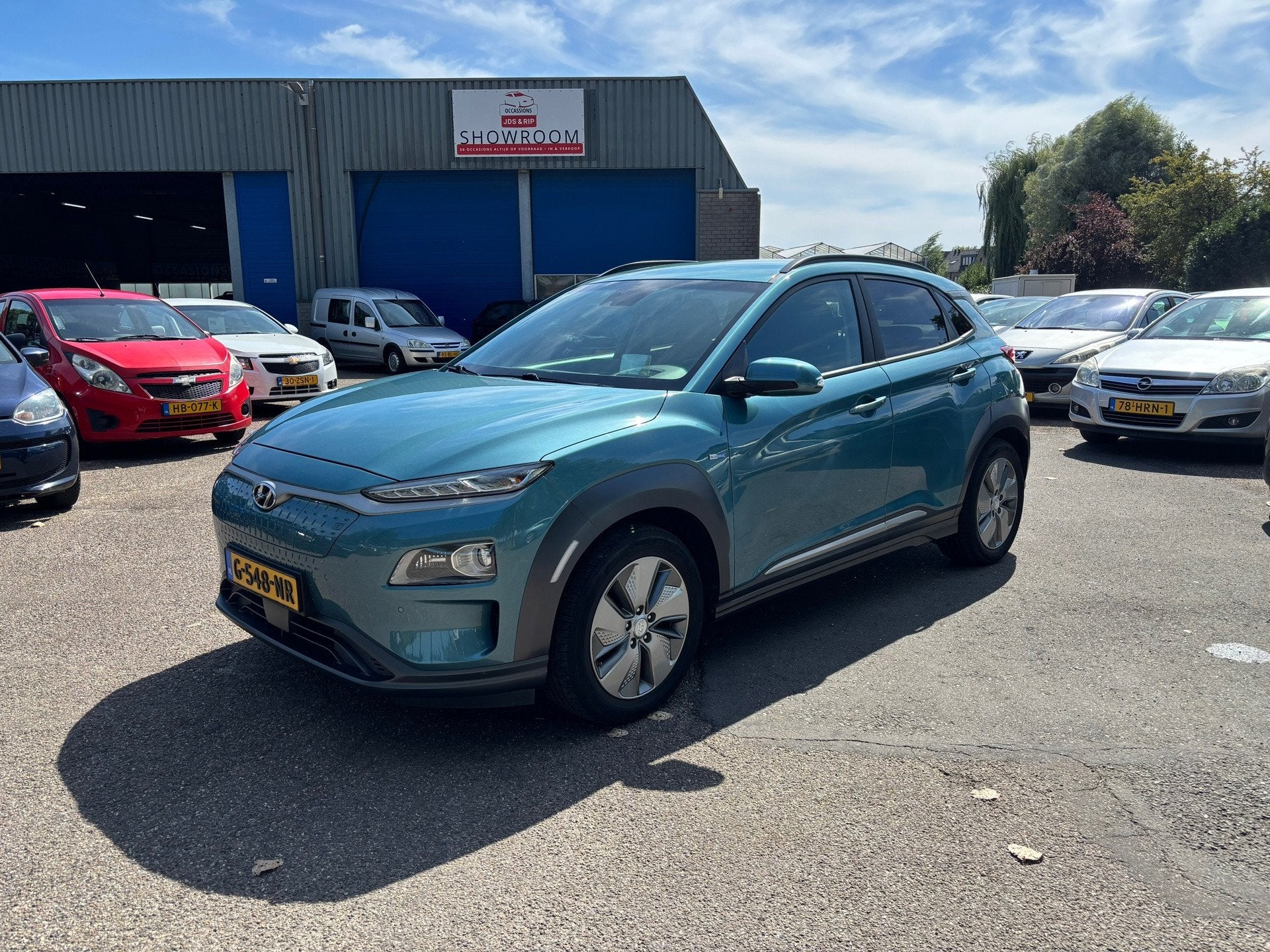 Hyundai Kona EV Premium 64 kWh Vol Optie’s !, Gebruikt, Zwart, 174 min, Blauw