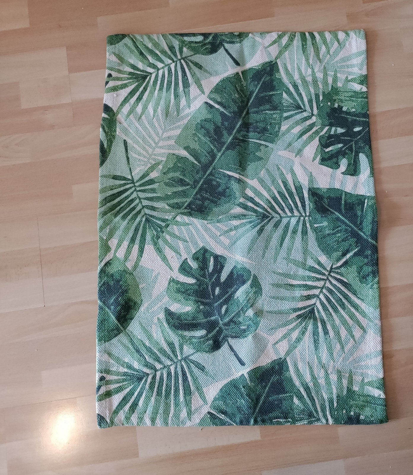 Decoratief kleedje met bladeren, Ophalen