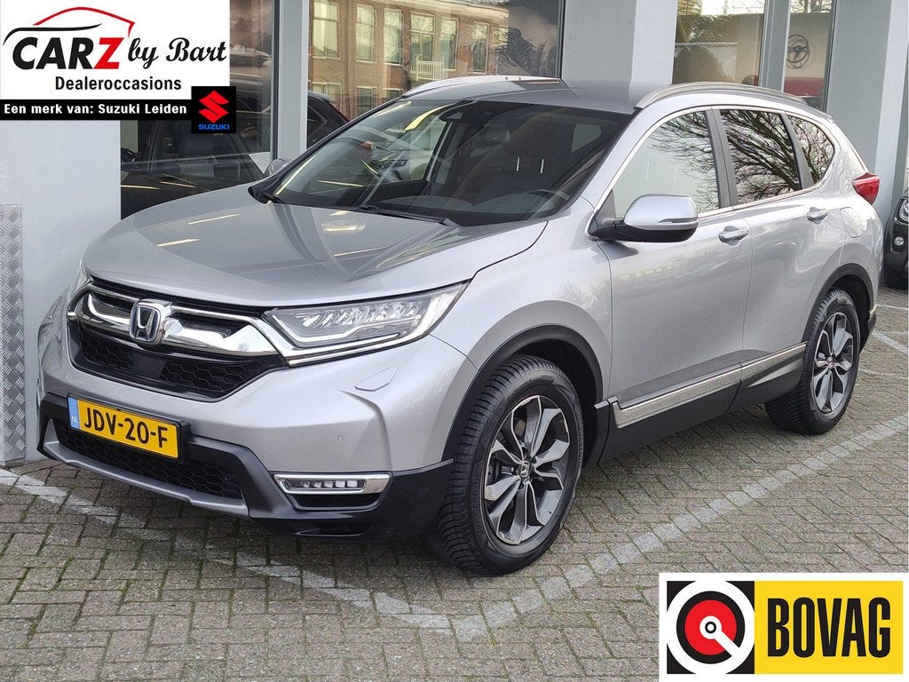 Honda CR-V 2.0 E:HEV HYBRID ELEGANCE Leder | Dodehoeksensore, Auto's, Honda, 12 maanden, Gebruikt, 4 cilinders, Bedrijf