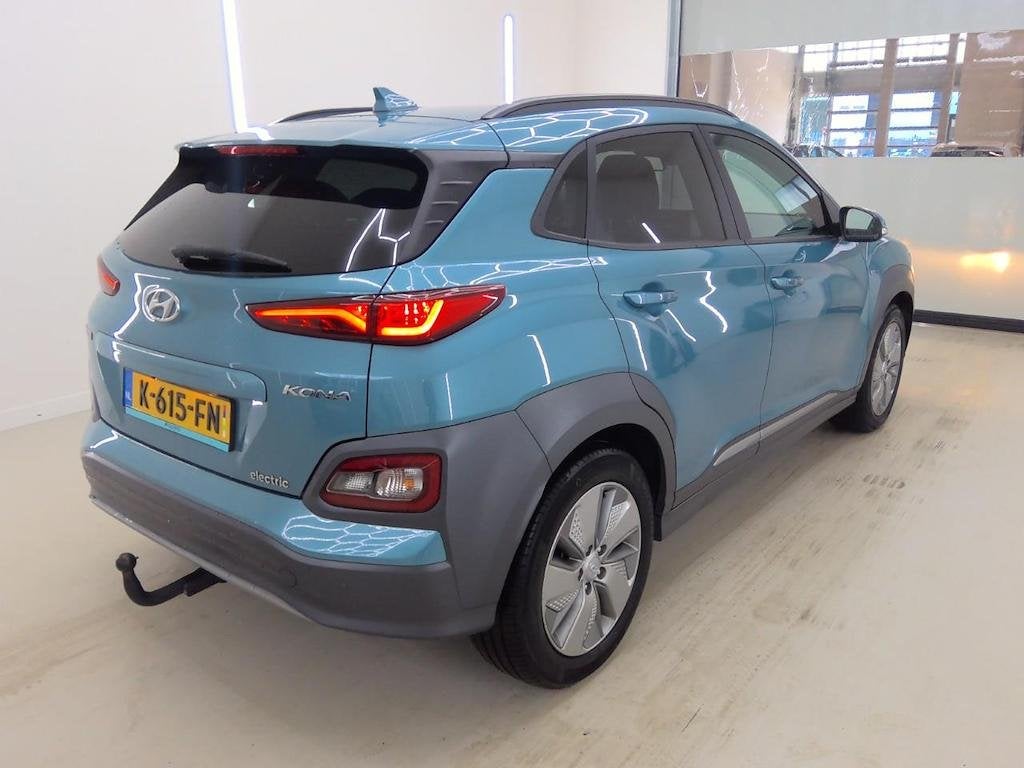 HYUNDAI KONA EV FASHION 64 kWh (100% SOH) I 3-FASE LADEN I T, Verwarmde buitenspiegels, Stof, Gebruikt, Huisgarantie