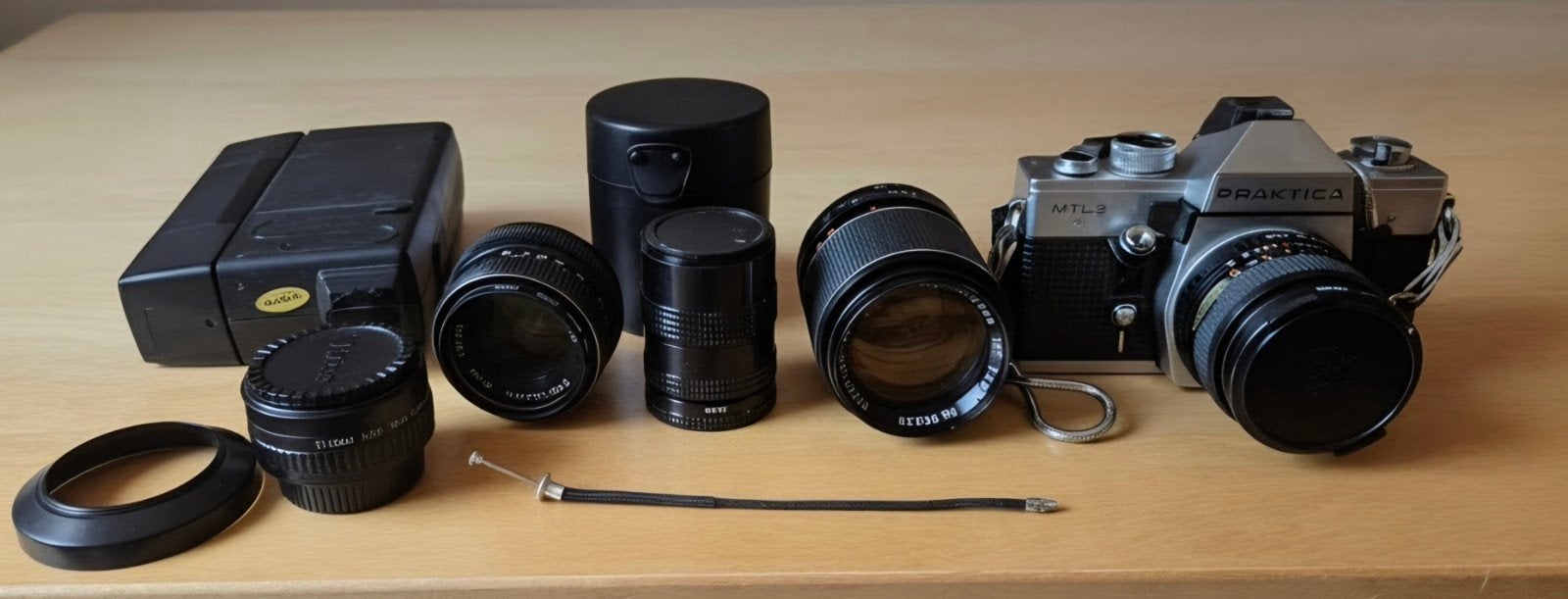 Praktica MTL 3 Spiegelreflexcamera met diverse lenzen, Audio, Tv en Foto, Ophalen of Verzenden