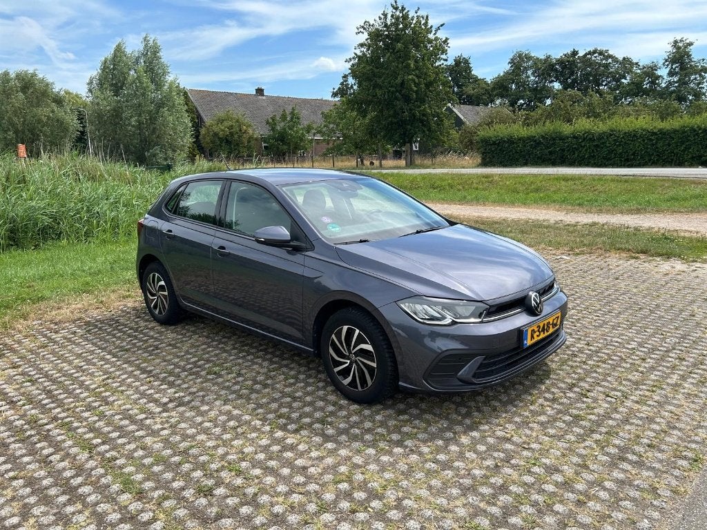 Volkswagen Polo | 1.0 TSI 95pk | 08-2022 | Grijs | 59.800KM, Voorwielaandrijving, Stof, 1072 kg, 49 €/maand