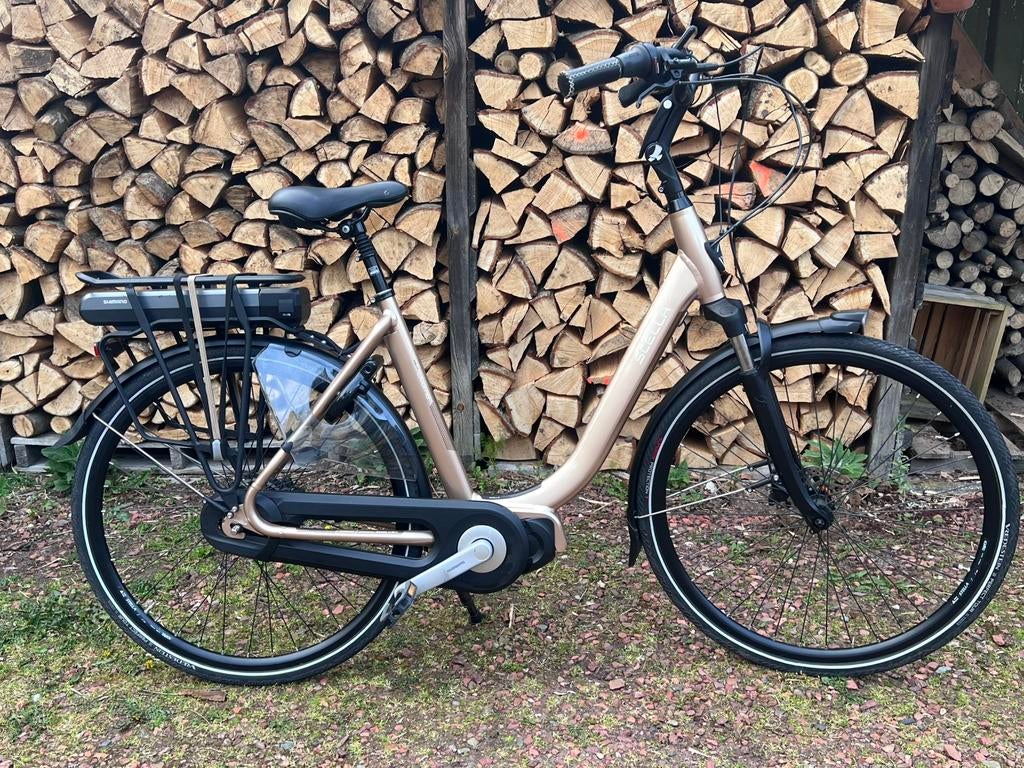 Stella Livorno elektrische fietsen Shimano Steps middenmotor, Zo goed als nieuw, 51 tot 55 cm, 50 km per accu of meer, Ophalen