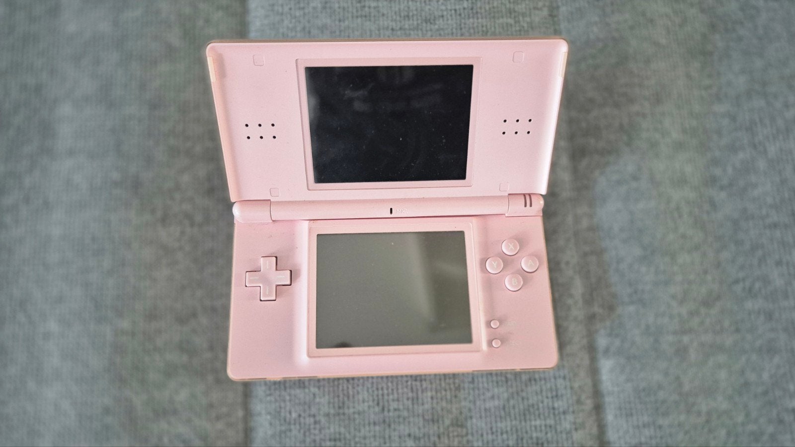 Roze Nintendo DS Lite - defect, Spelcomputers en Games, Spelcomputers | Nintendo 2DS en 3DS, Ophalen of Verzenden, Gebruikt, Roze