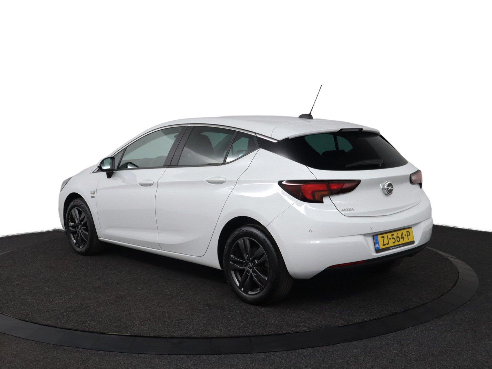 Opel Astra 1.0 Turbo 120 Jaar Edition |NAP|5drs.|Airco|Cruis, Auto's, Gebruikt, 610 kg, Wit, Origineel Nederlands