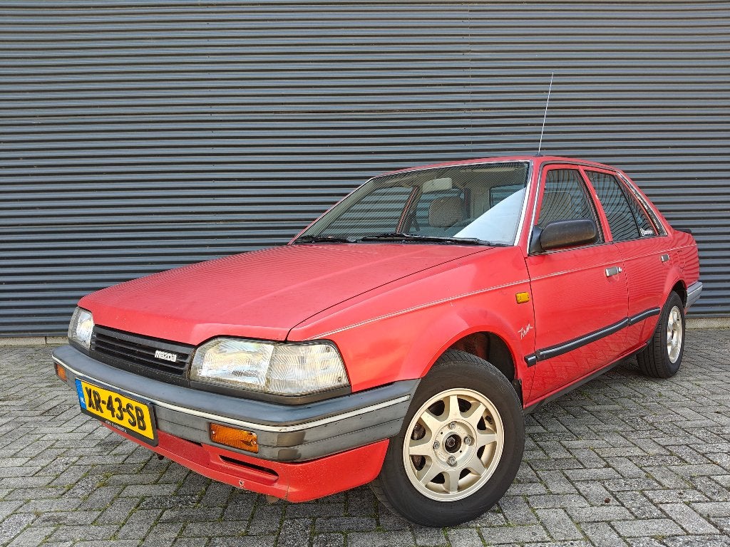 Mazda 323 1.3 Sedan | 1989 | Nieuwe APK | Loopt goed | Bijz, Stof, 4 cilinders, 905 kg, Origineel Nederlands