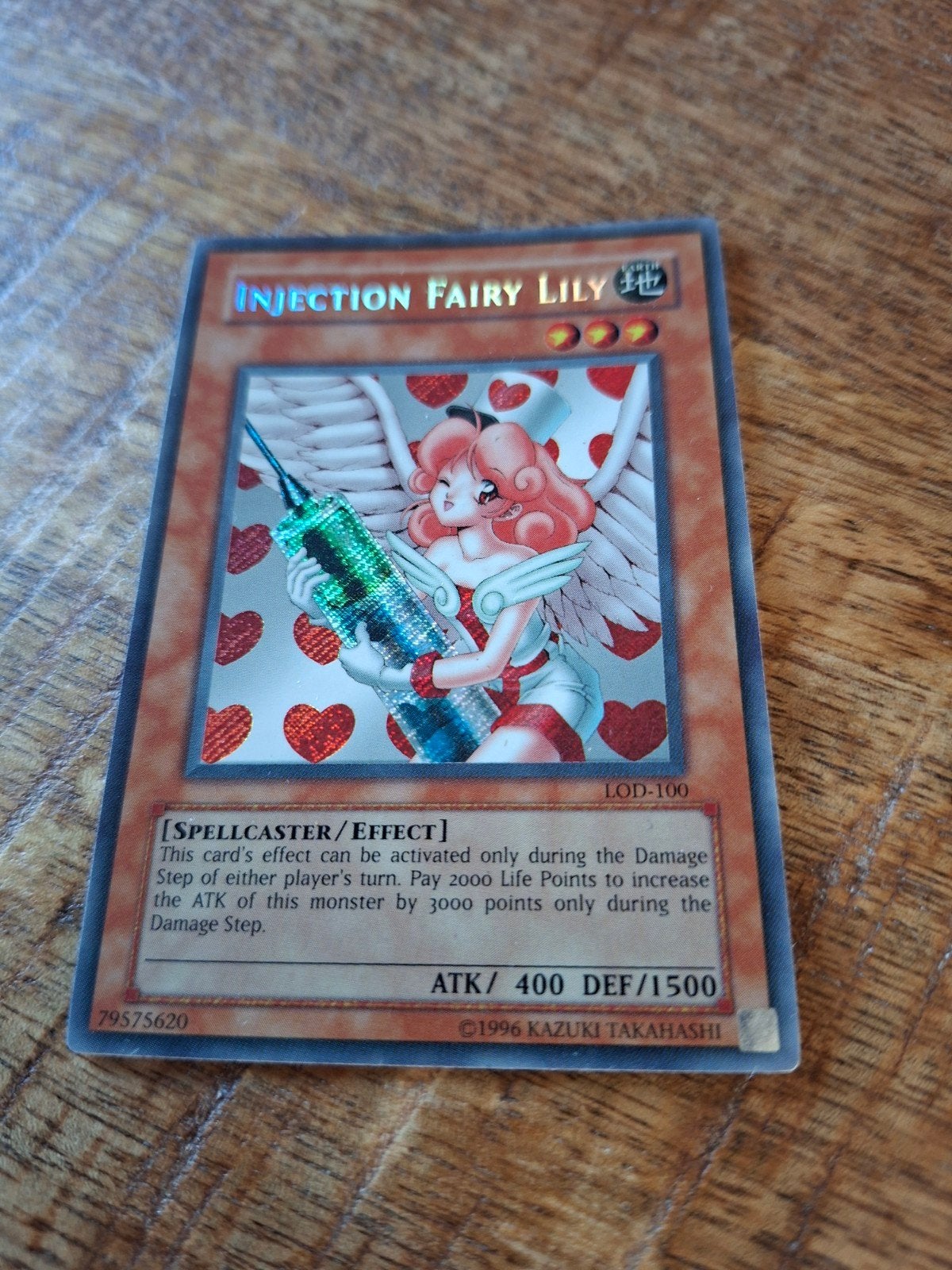 Yu-Gi-Oh! Injection Fairy Lily LOD-100 Foil Kaart, Ophalen of Verzenden, Gebruikt, Losse kaart, Foil