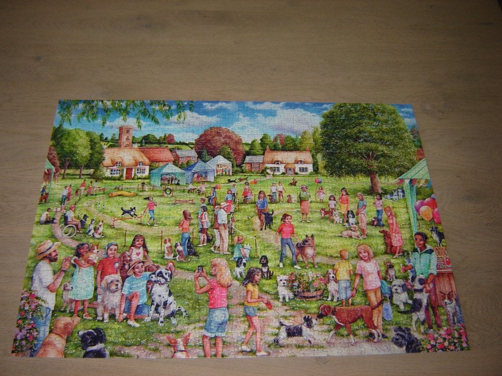 Puzzel Gibsons THE VILLAGE DOG SHOW 1000 st., Hobby en Vrije tijd, Denksport en Puzzels, Ophalen of Verzenden, 500 t/m 1500 stukjes
