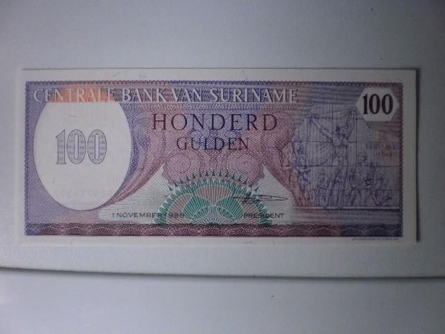 Suriname - 100 Gulden- Bankbiljet, Postzegels en Munten, Bankbiljetten | Amerika, Verzenden, Zuid-Amerika, Los biljet