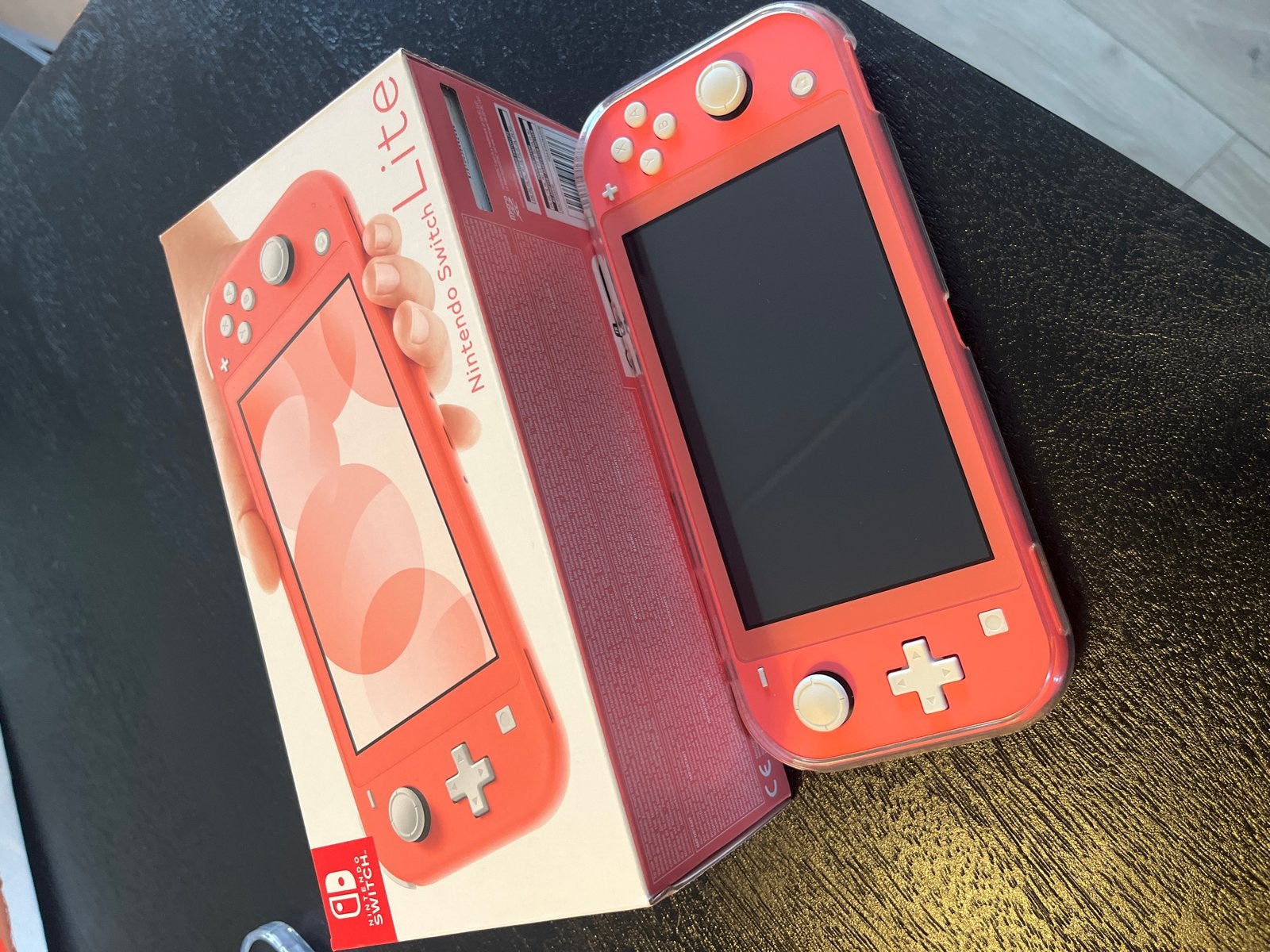 Nintendo Switch Lite Koraalrood met hoesje, Ophalen, Zo goed als nieuw, Zonder controller, Switch Original