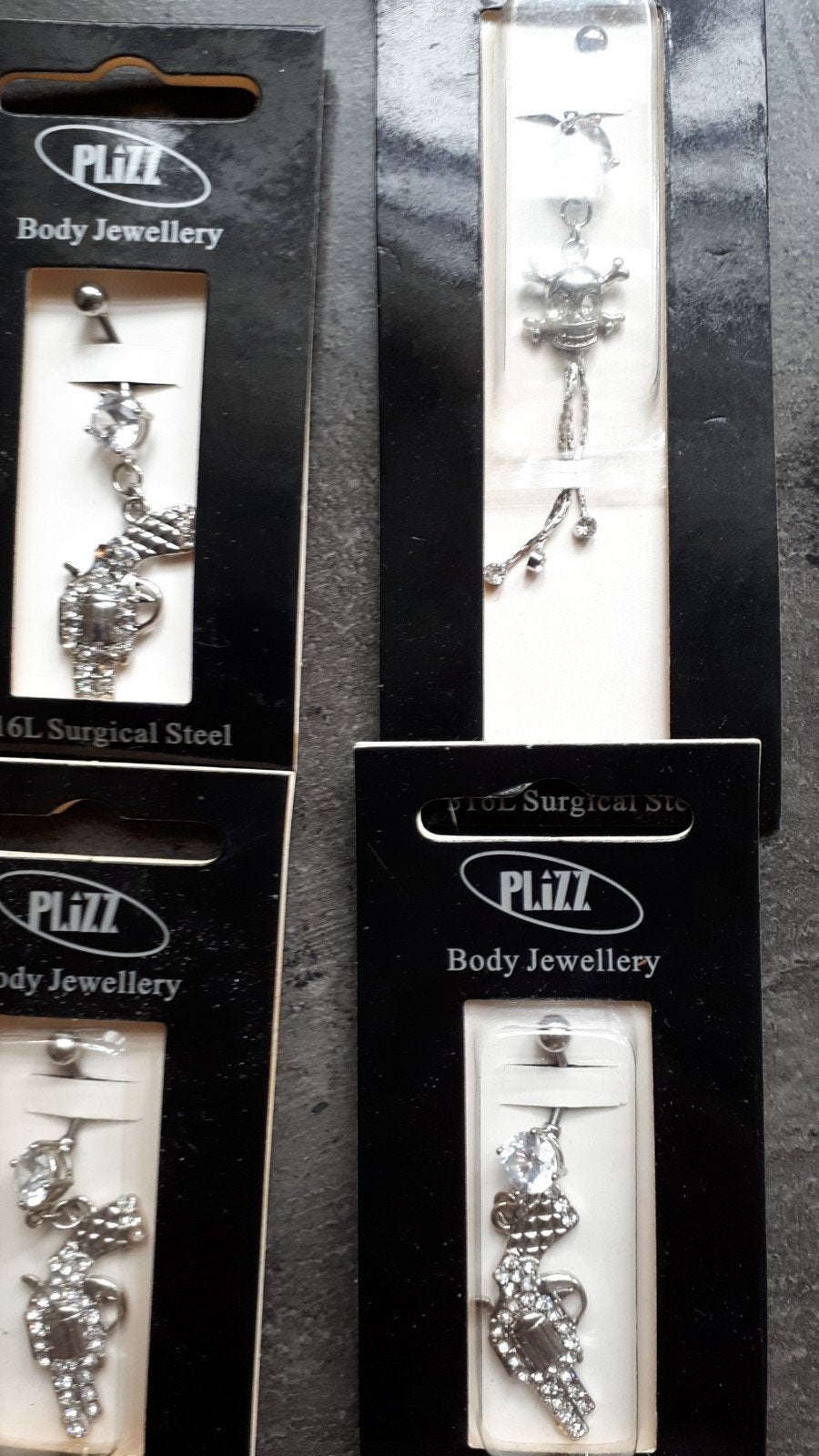 Leuke navel piercings met strass steentjes prijs p.st.zilver, Staal, Nieuw, Ophalen of Verzenden, Neuspiercing