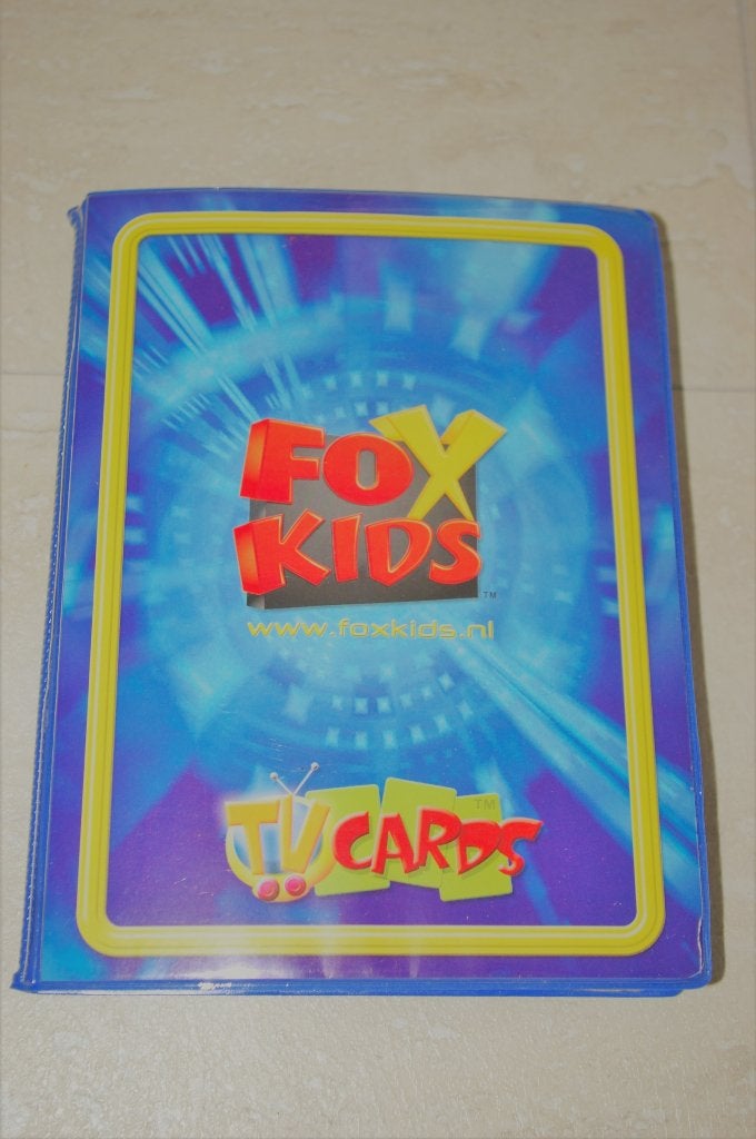 Fox Kids verzamelalbum met 61 verschillende kaartjes in plas, Ophalen of Verzenden, Zo goed als nieuw