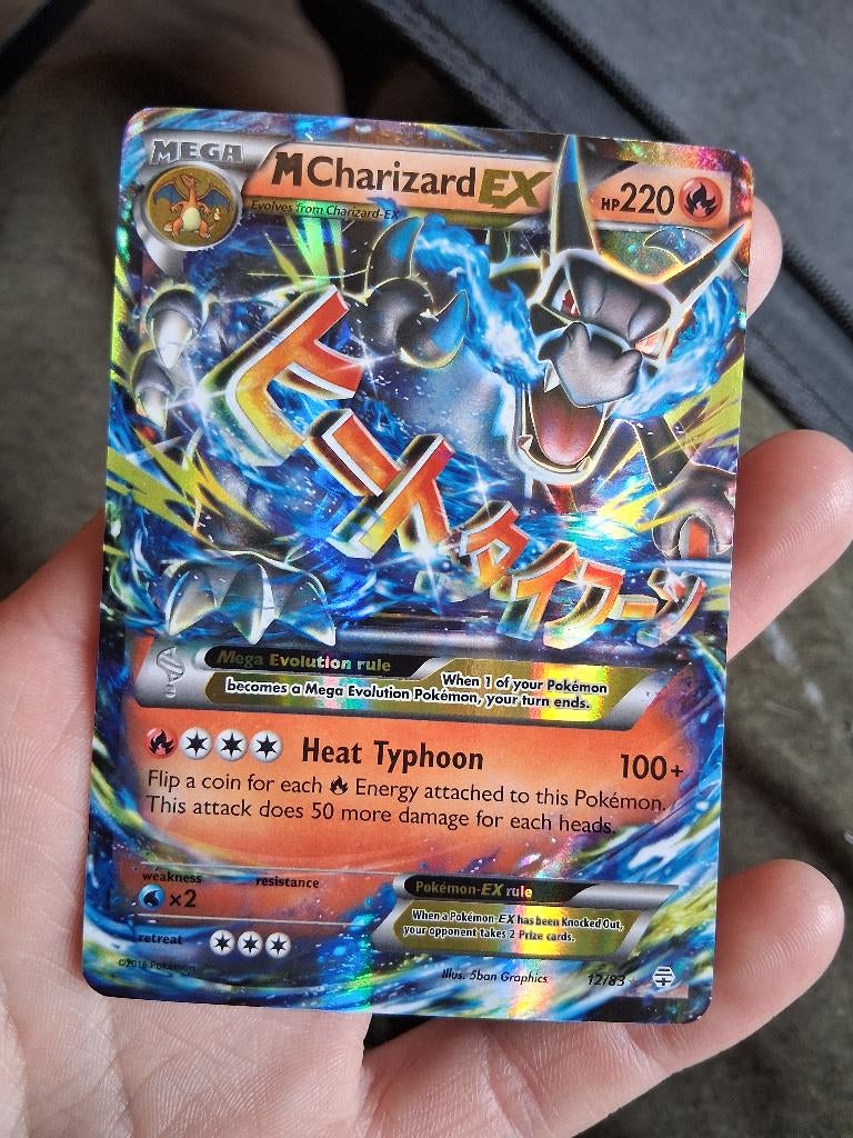 M charizard ex, Ophalen of Verzenden, Zo goed als nieuw, Losse kaart