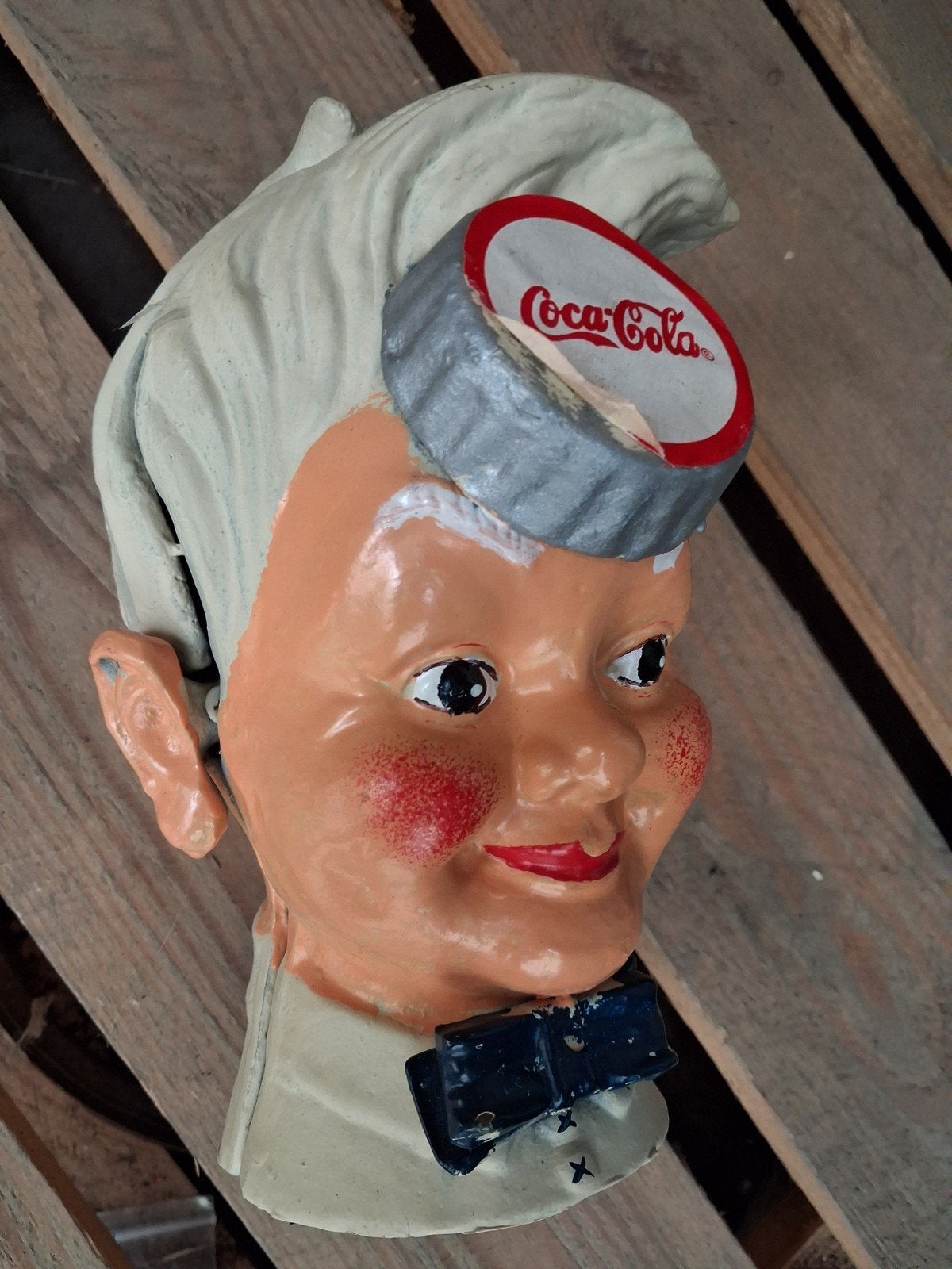 Gietijzeren oude coca cola spaarpot .zwaar, Ophalen of Verzenden, Gebruiksvoorwerp