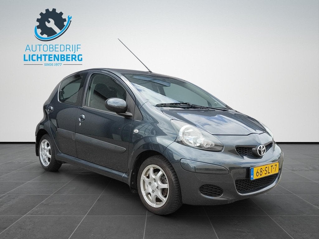 Toyota Aygo 1.0-12V Comfort Navigator AIRCO / AUTOMAAT, Auto's, Euro 5, Stof, Gebruikt, 4 stoelen