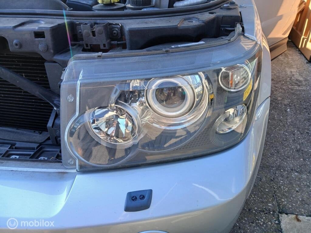 Koplamp Range Rover Sport L320 AFS bochtenverlichting, Land Rover, Ophalen of Verzenden