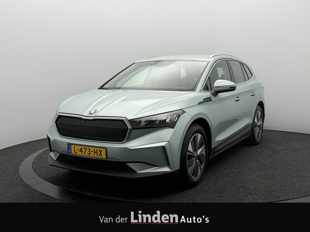 Skoda Enyaq iV 60 SOH 94,9% | Warmtepomp | Trekhaak | Camera, 390 km, Achterwielaandrijving, Gebruikt, Zwart