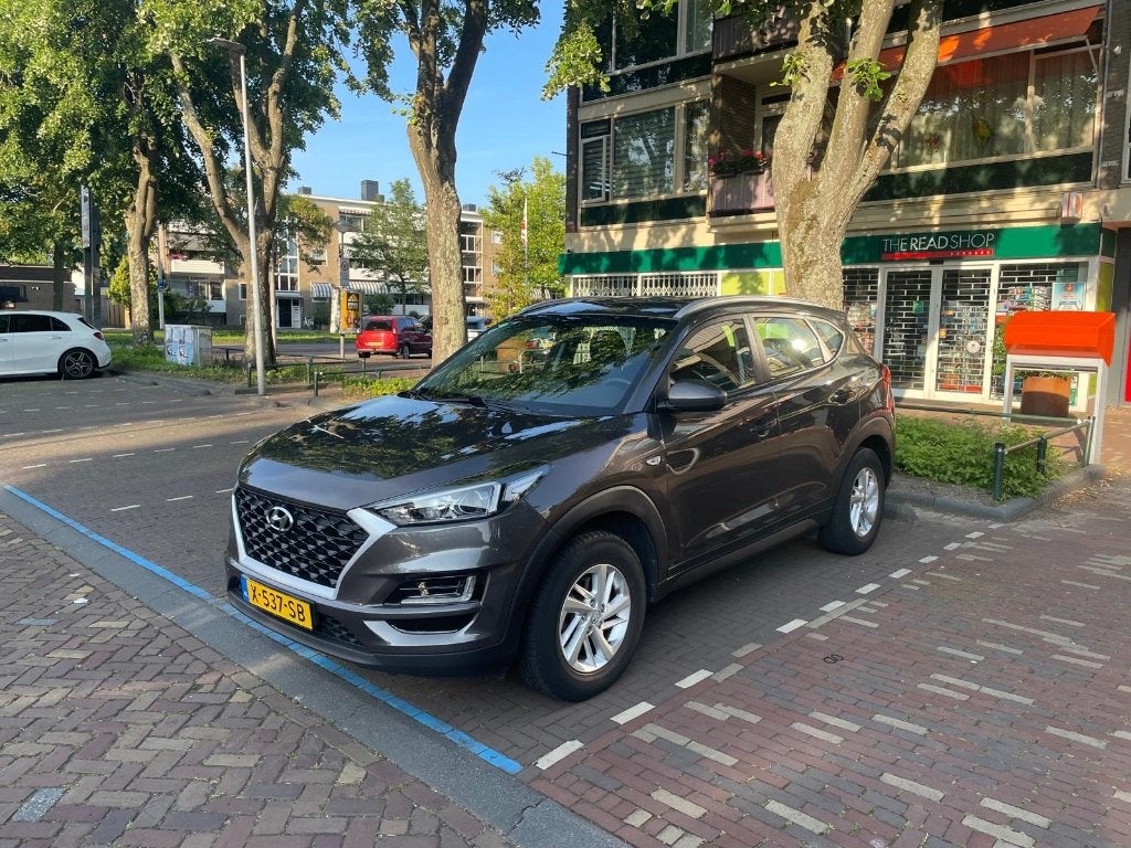 Hyundai Tucson 1.6 GDi 132pk 2019 grijs/bruin, Voorwielaandrijving, Stof, 1591 cc, 4 cilinders