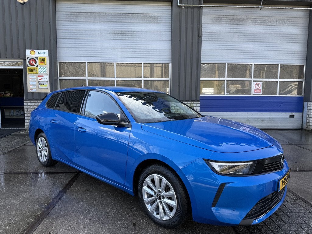 Opel Astra Sports Tourer 1.2 Turbo (bj 2023), Voorwielaandrijving, Gebruikt, 1199 cc, Blauw